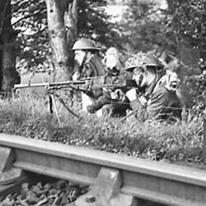 British Gunner on a Railway Embankment